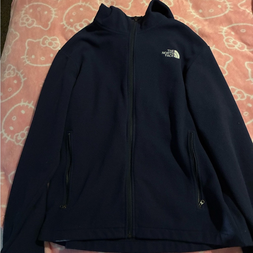 The Northface blue jacket zip up
